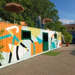 La Cascina, un container dipinto dagli studenti diventa sede della logistica per la Coppi